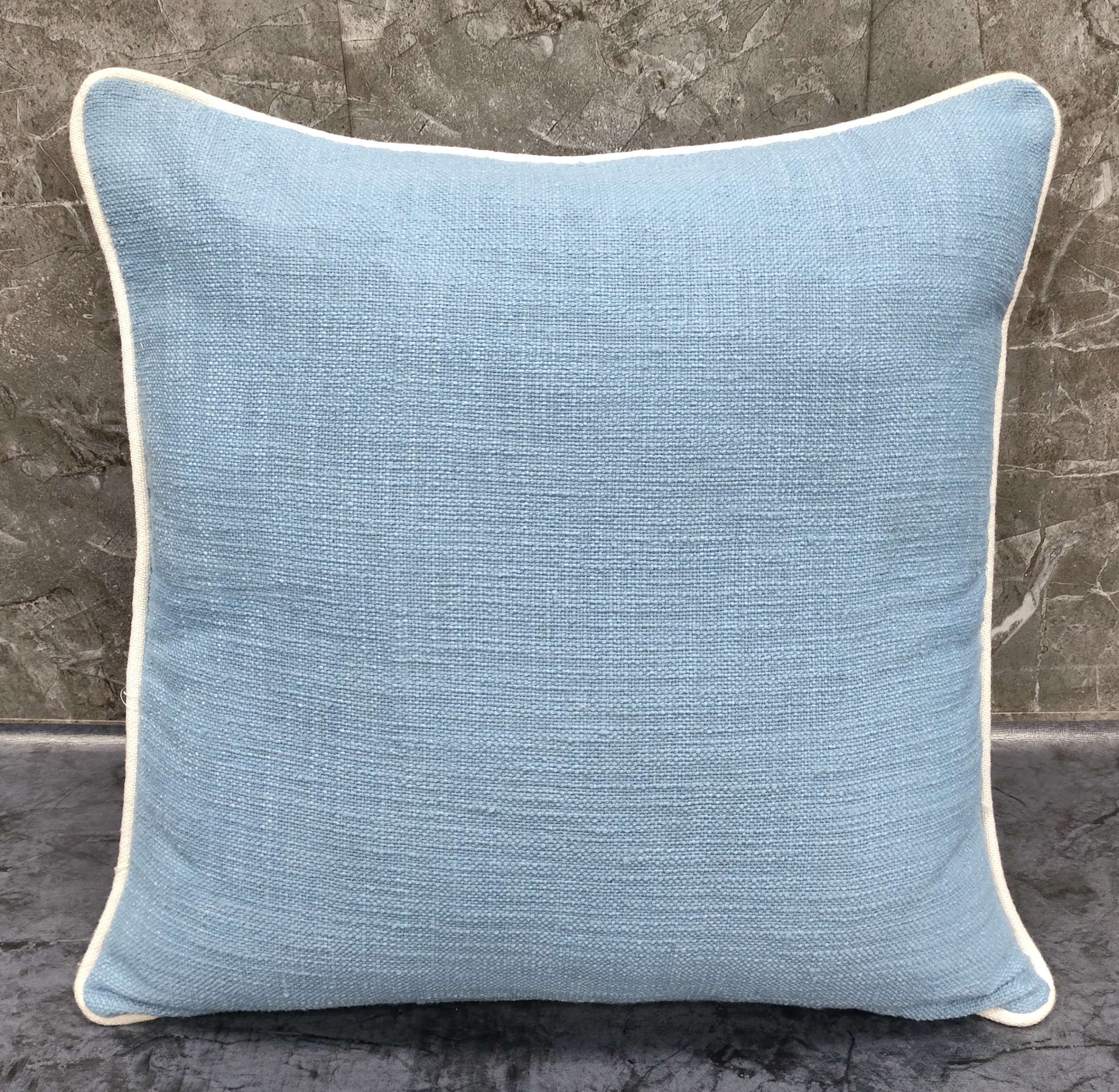 Floor Cushion | Slub Woven Cushion in soft blue color with white trim, ideal for enhancing home décor.