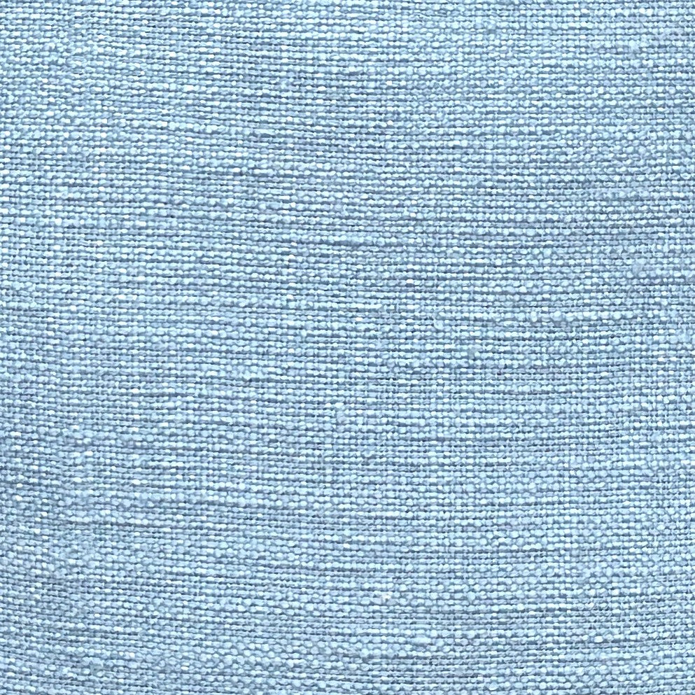 Floor Cushion cover fabric texture in soft blue, showing elegant slub woven design for home décor.