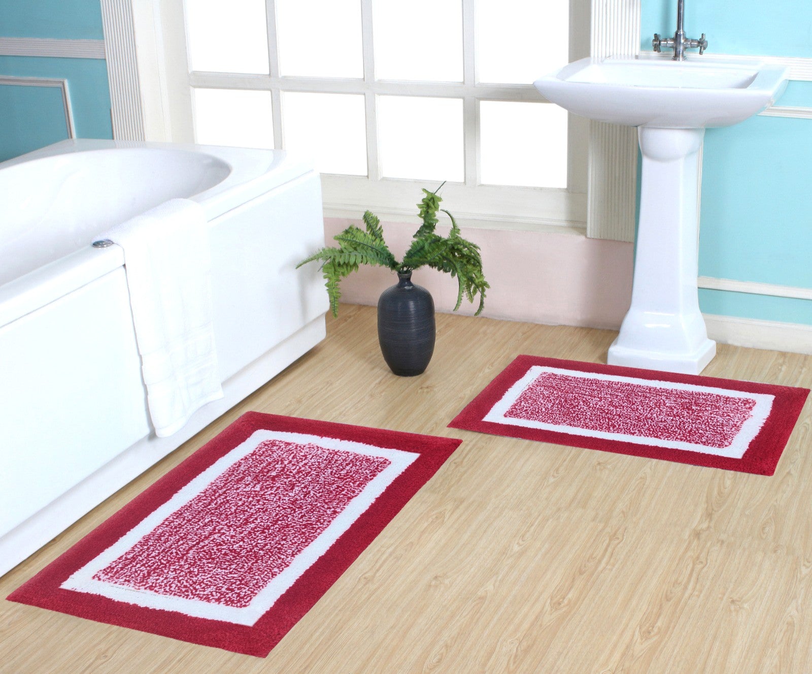 Door mat bathmat set placed in bathroom with natural lighting