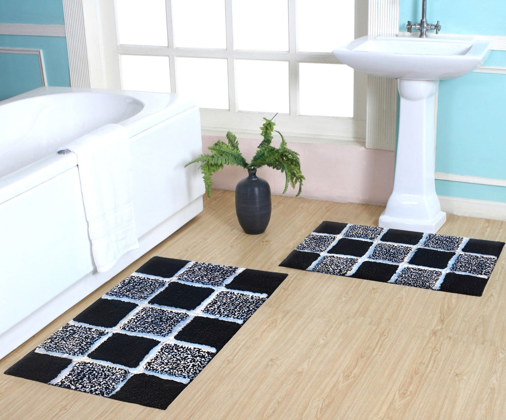 Microfiber tufted bath mat set in box design placed in bathroom, enhancing comfort and modern style.