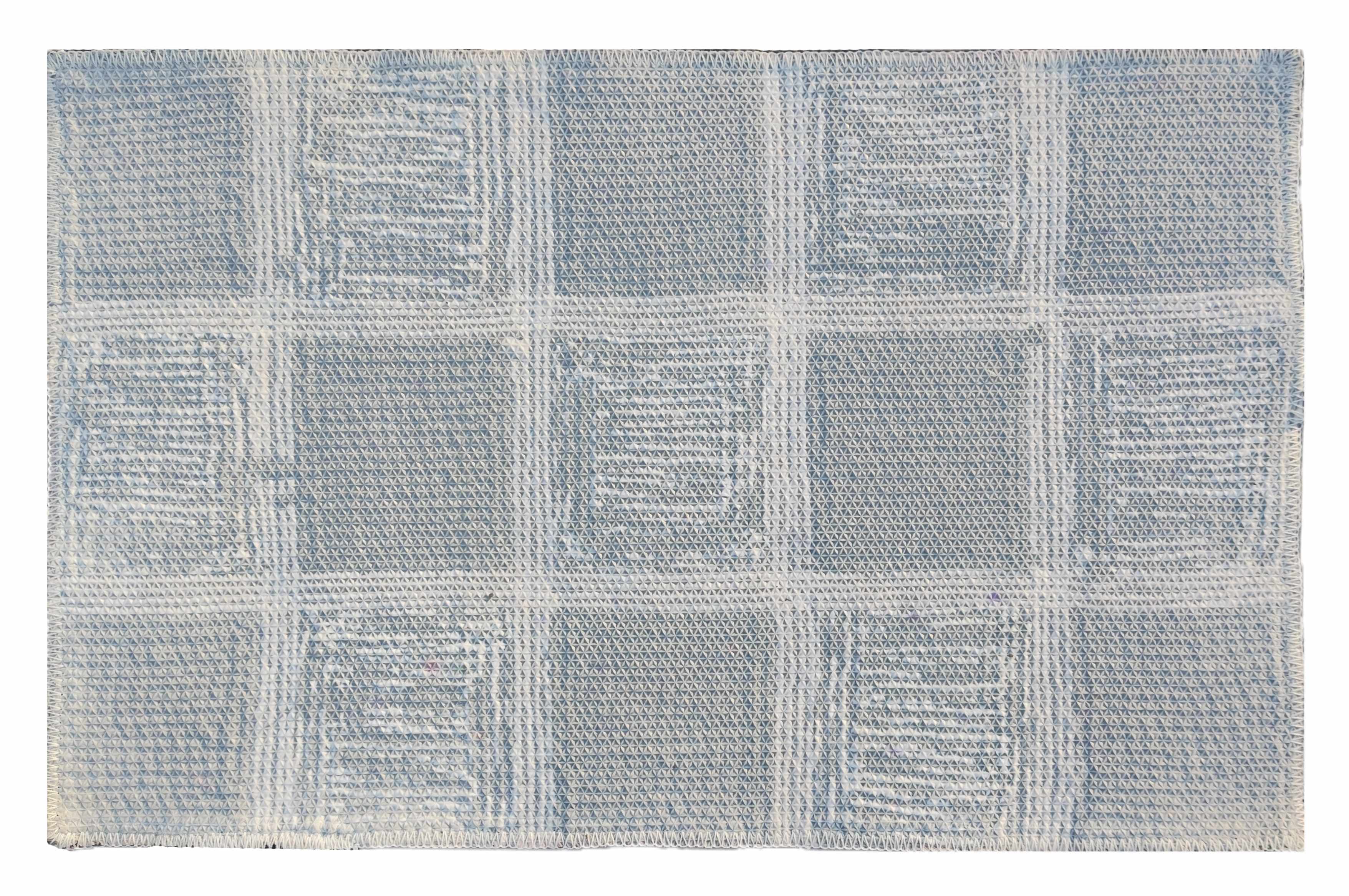 Microfiber tufted bath mat with box design in soft blue color, perfect for bathroom style and comfort.